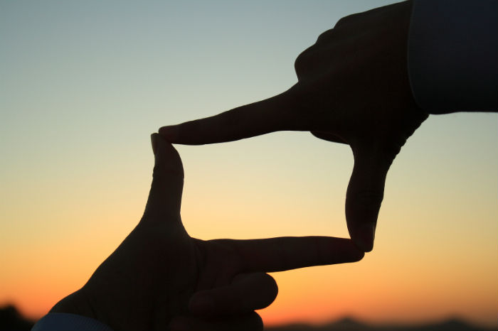 finger frame sunset