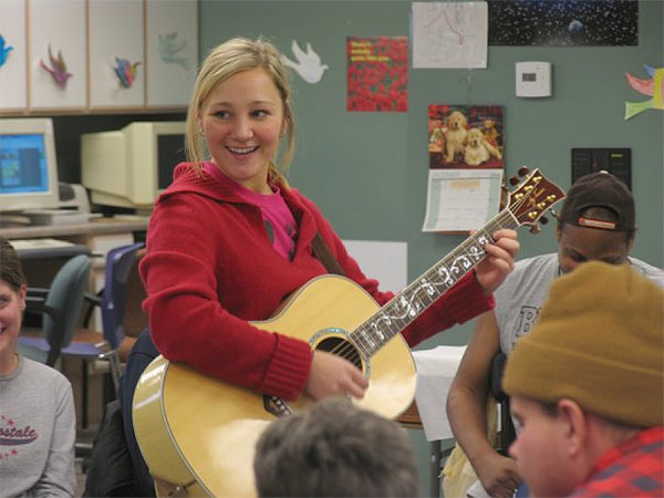 music therapist with guitar